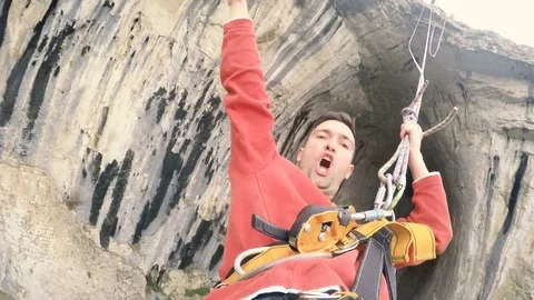 Jump Pendulum, bungee at Prohodna cave, Bulgaria. Extreme and fun sport Stock Footage 82211055