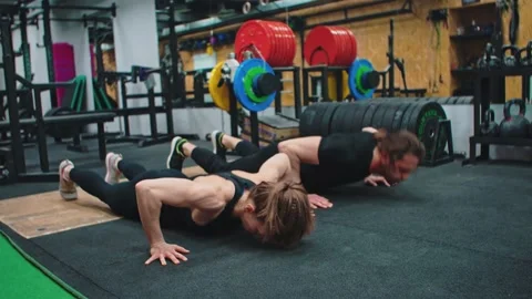 Jump push up exercise in the gym Stock Footage 153594453