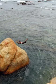 Jump from the rock Stock Photos
