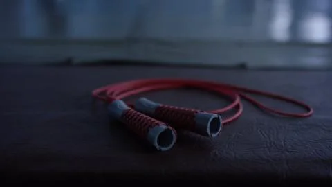 Jump rope lying on the floor, closeup 写真素材
