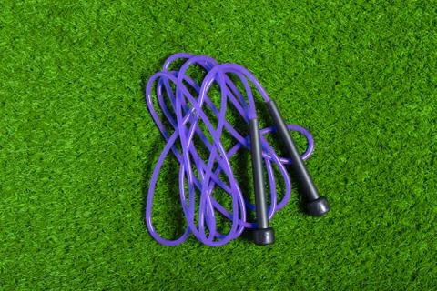 Jump ropes on grass. Stock Photos