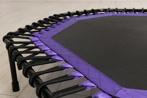 Jump small game empty space cyan growth white purple trampoline fitness leisure Foto stock