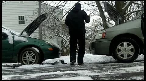 Jump Start Car Battery in Winter with Snow Stock Footage 20536003