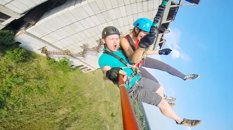 Jump in tandem with selfie Stock Footage 68070893
