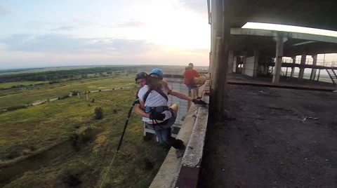 Jump in tandem at sunset background Stock Footage 68071075