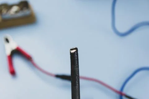 Jumper cable, on a blue background Stock Photos