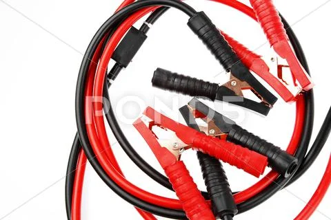 Jumper cables on plain background Stock Photos