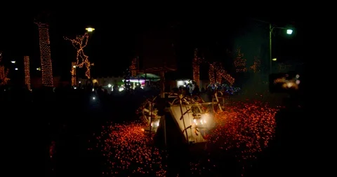 Jumping and Dancing Man in Fireworks Bull Costume for Traditional Celebration 動画素材 125789679