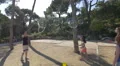 Jumping and playing with big soap bubbles in Park Guell, Barcelona 4k or 4k+ Resolution