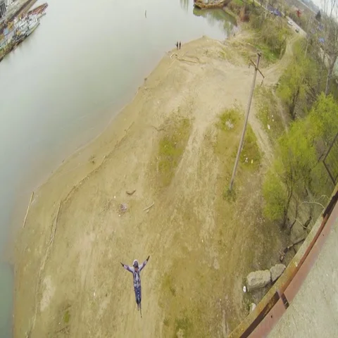 Jumping from backwards Bridge Stock Footage 69538905