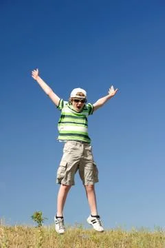 Jumping boy Stock Photos
