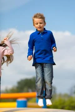 Jumping boy Stock Photos