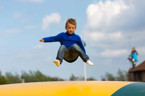 Jumping boy Stock Photos