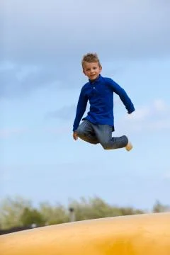 Jumping boy Stock Photos
