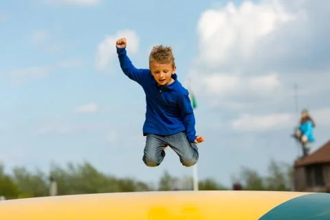 Jumping boy Stock Photos
