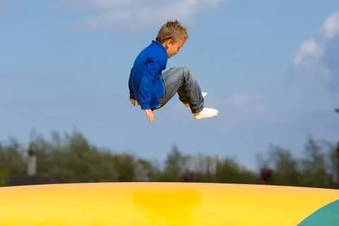 Jumping boy Stock Photos