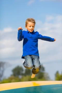Jumping boy Stock Photos