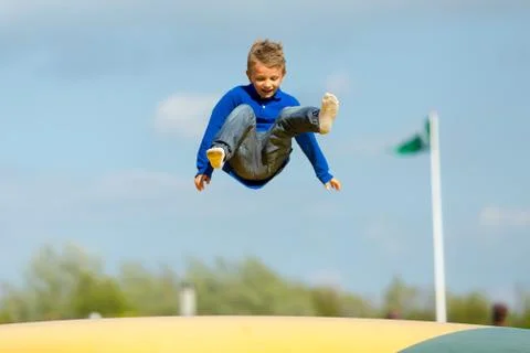 Jumping boy Stock Photos