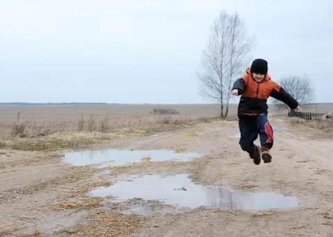 Jumping boy Stock Photos
