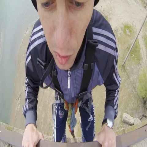 Jumping from the bridge in the first person backwards  Gopro Stock Footage 69539315
