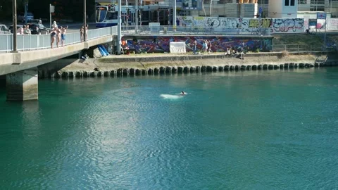 Jumping off a bridge in the river Video stock 135538709