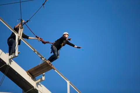 Jumping from the bridge with a rope. RoupeJumping Stock Photos