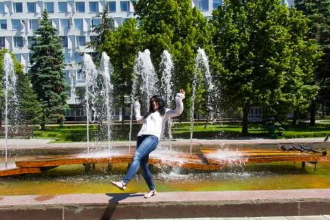 Jumping brunette Stock Photos