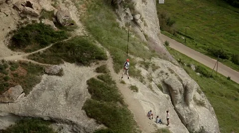Jumping off a cliff, rope jumping Vídeos de archivo 53779904