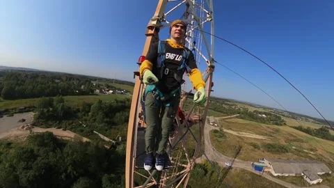 Jumping with a climbing rope from a tower 50 meters Stock Footage 196031851