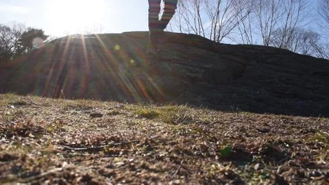 Jumping onto dry particles Video stock 153563774