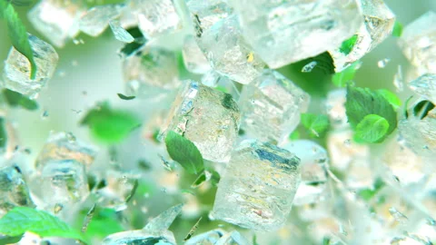 Jumping frosted ice cubes with mint leaves in 4K Slow motion Stock Footage 147334053