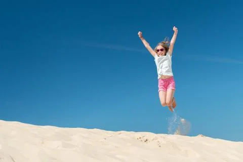 Jumping girl Stock Photos