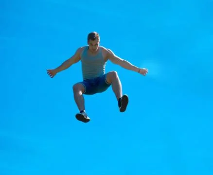 Jumping up guy. Background blue sky. Foto stock