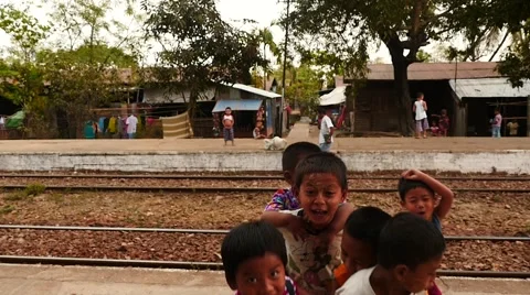 Jumping happy smiling children posing in Yangon of Myanmar Stock Footage 61449665