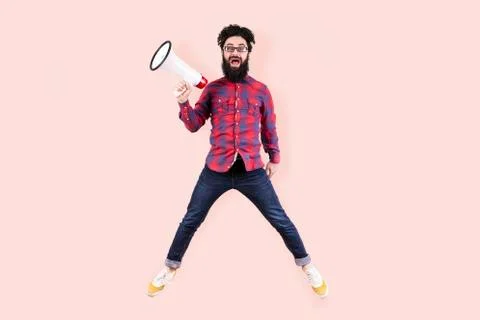 Jumping hipster Stock Photos