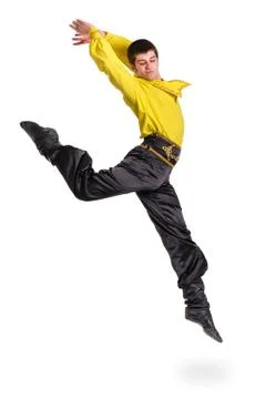 Jumping man wearing a toreador costume. Isolated on white in full length Stock Photos