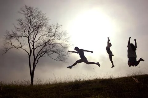 Jumping on mountain Stock Photos