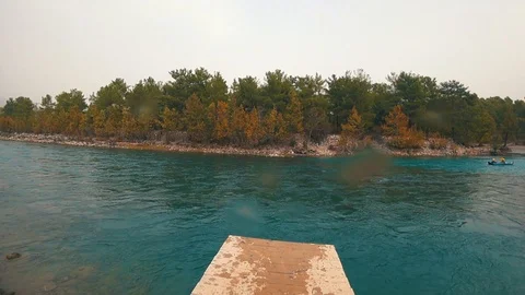 Jumping into the mountain river from the bridge. Stock Footage 100829917