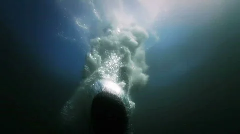 Jumping into the ocean Stock Footage 681414