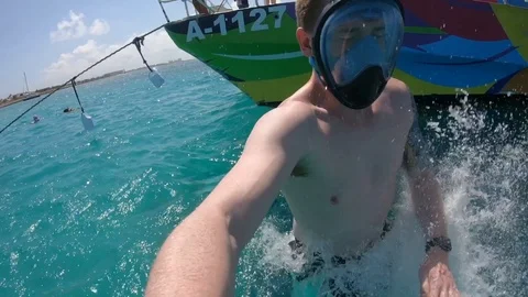 Jumping into the Ocean to Snorkel Stock Footage 102798638