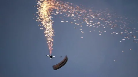 Jumping parachutists into the river Stock Footage 90115753