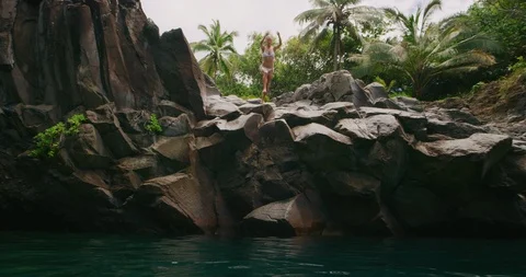 Jumping into paradise Stock Footage 108131956