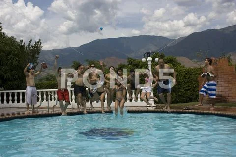 Jumping into Pool Stock Photos