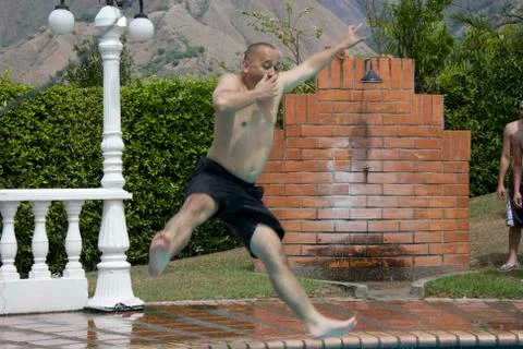 Jumping into Pool Stock Photos