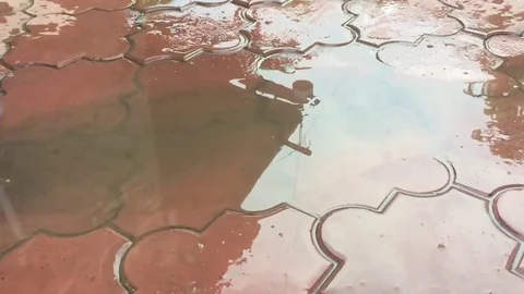 Jumping in a puddle Stock Footage 78784297