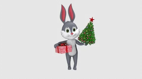 Jumping rabbit with gift box and Christmas tree - looped with alpha channel. Stock Footage 196784727