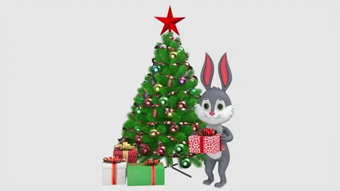 Jumping rabbit with gift box near the Christmas tree - looped alpha channel. Stock Footage 196140516