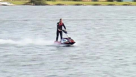 Jumping red jetski Stock Footage 85572270