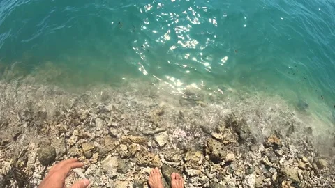 Jumping from rock Stock Footage 132260982