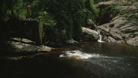 Jumping Off Rocks, Into Fresh Water Below, Paraty Brazil, 4k Stock Footage 239558567